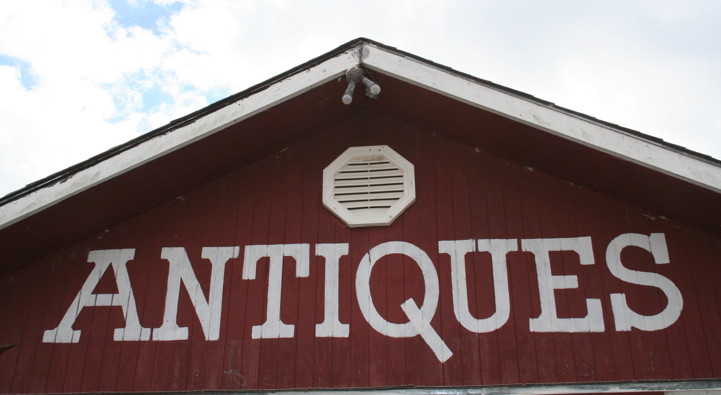 Antique shopping sign