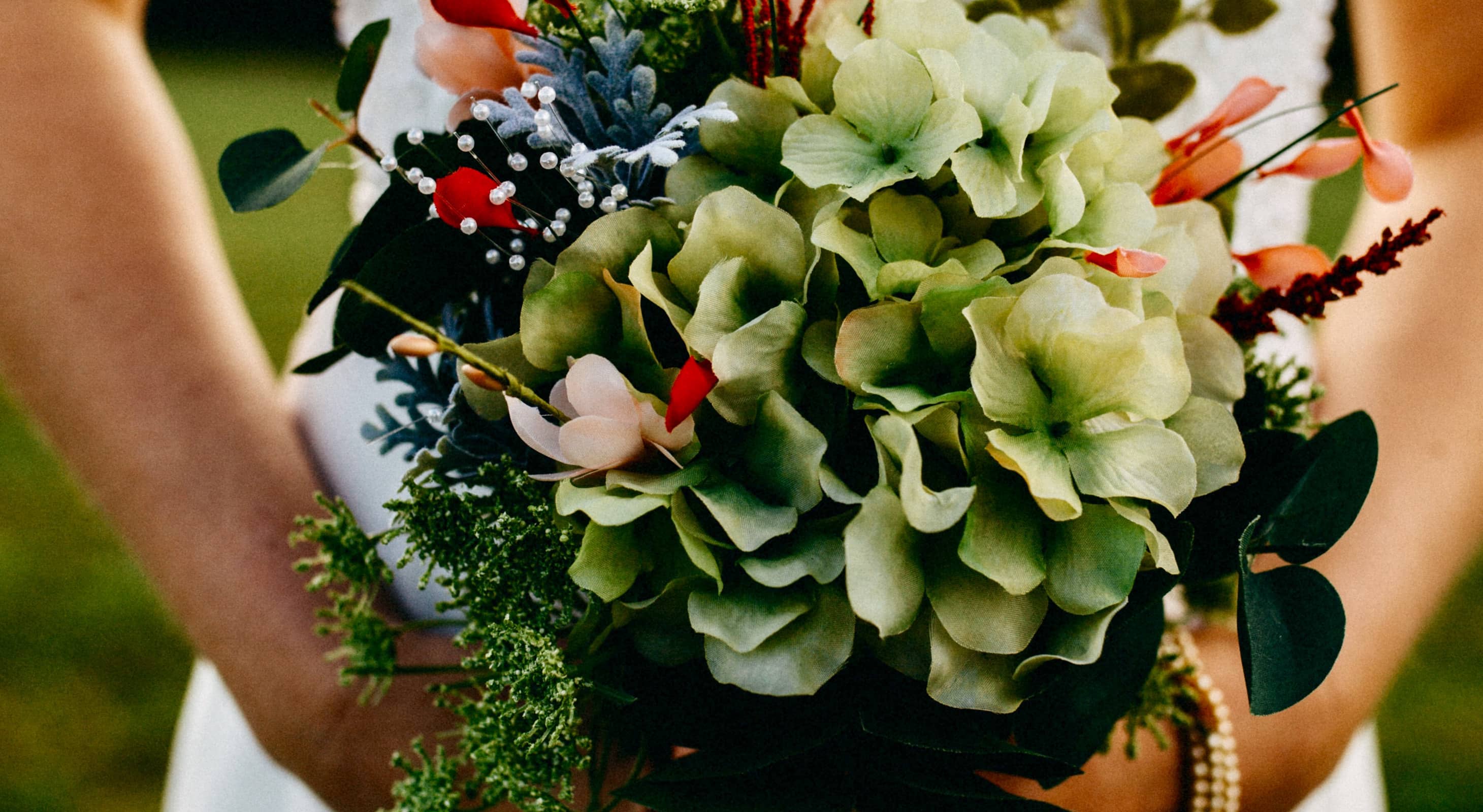 Bride holding wedding bouquet of flowers at an elopement in Northern Virginia